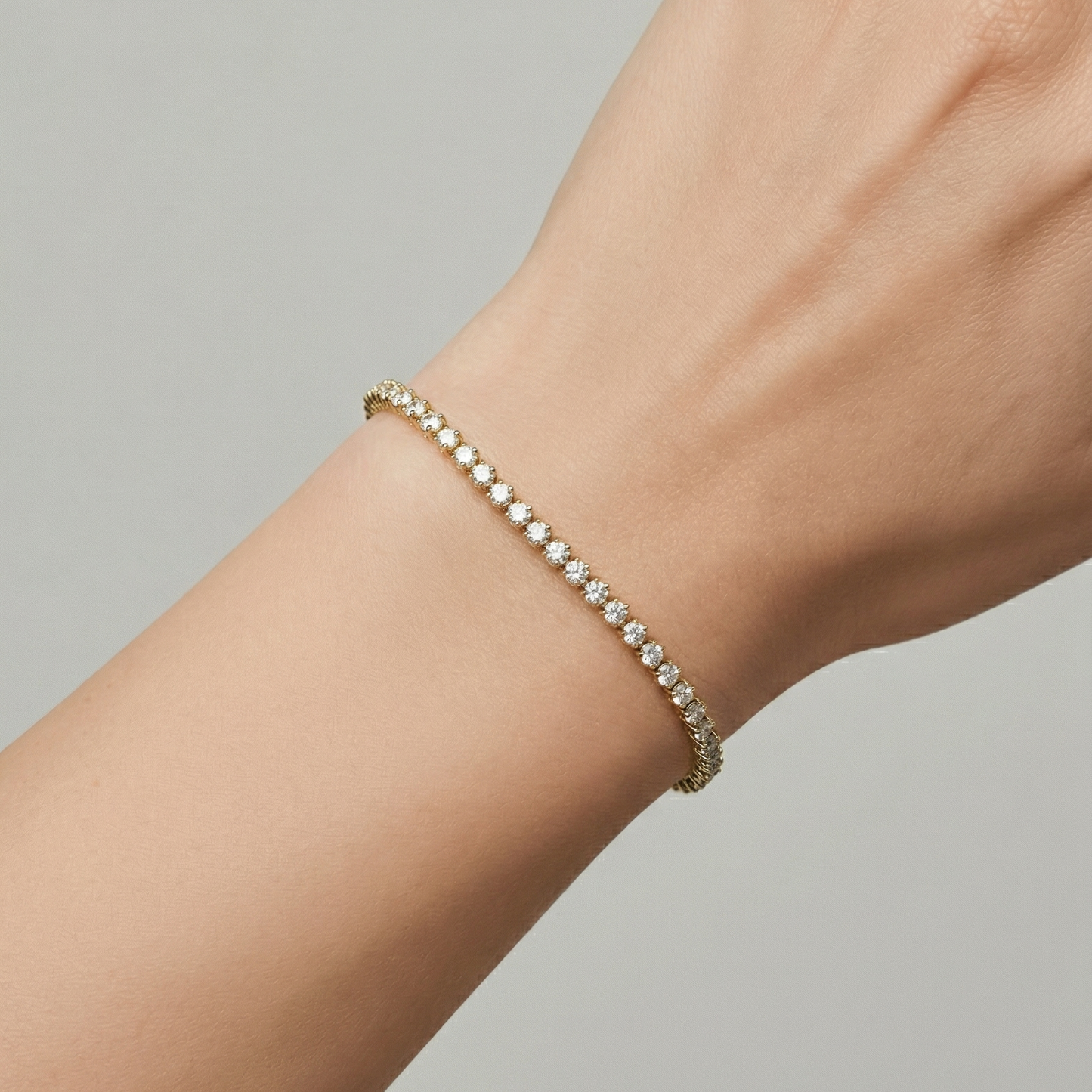 Pulseira Riviera 2mm 3 Garras Banho de Ouro