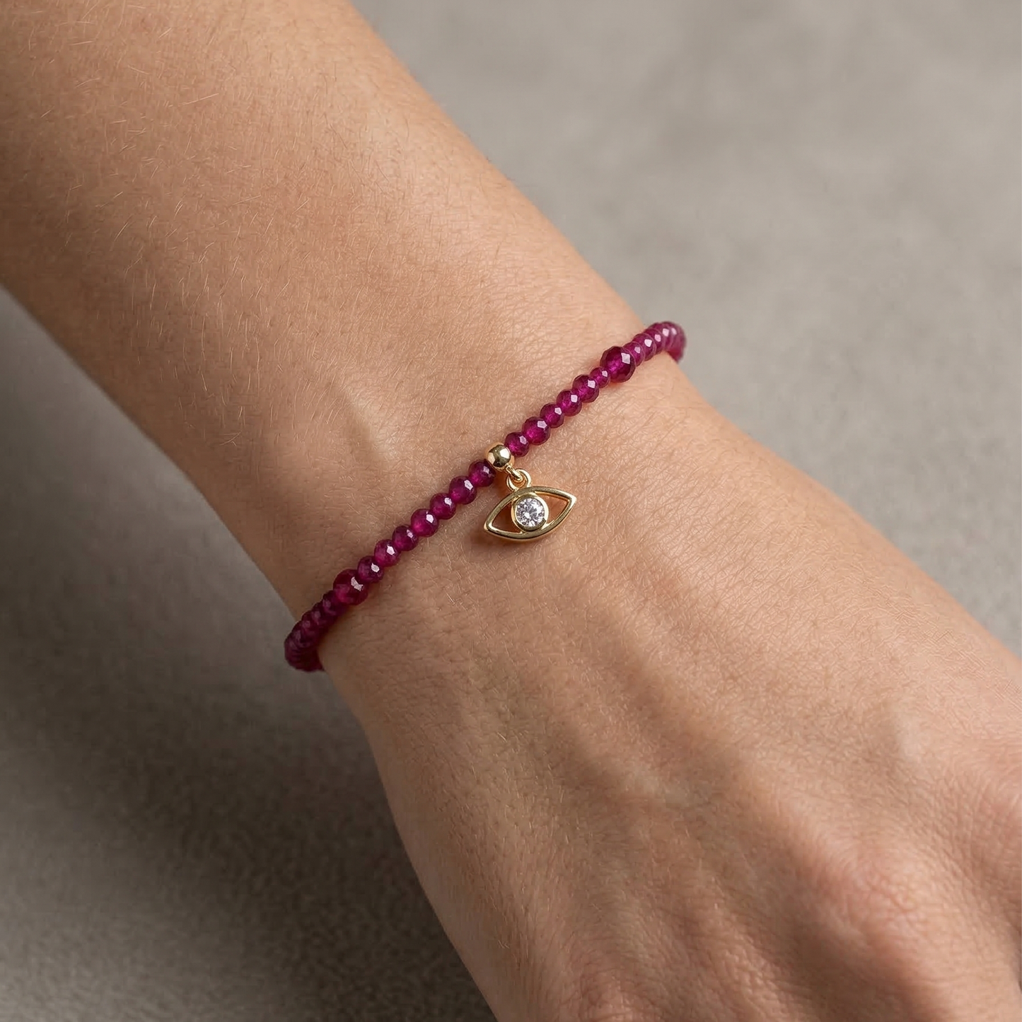 Pulseira Fio de Rubi com Olho Grego